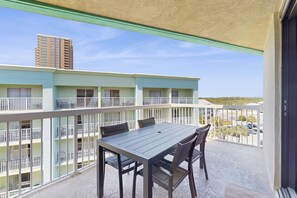 Outdoor dining - Beachside condo with private beach access, indoor/outdoor pools, & hot tub (Orange Beach)