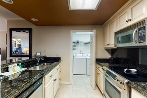 Fridge, microwave, oven, stovetop - Gulf Front ground floor condo with fishing pier and indoor and outdoor pools (Orange Beach)