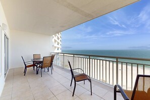 Outdoor dining - Beachfront condo w/ balcony & resort pools, gym, and sauna (Orange Beach)