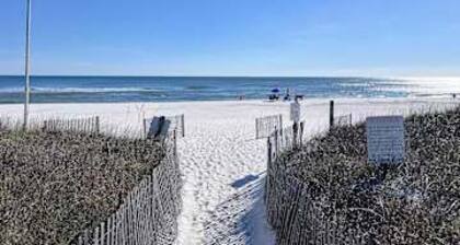 Gulf front condo with onsite snack bar, three shared pools, and internet