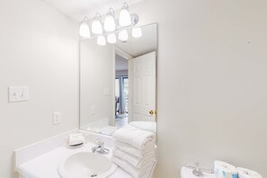 Shower, towels - Calming water view condo with full kitchen, balcony, pool, & TV - close to park (Orange Beach)