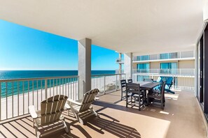 Outdoor dining - Beachfront 10th-floor condo with balcony, pools, hot tub, gym, WiFi, & AC (Orange Beach)