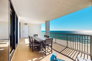 Outdoor dining - Beachfront 10th-floor condo with balcony, pools, hot tub, gym, WiFi, & AC (Orange Beach)