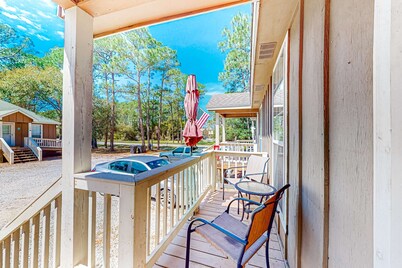 Perfectly located condo with beach access - deck, internet, W&D, & AC