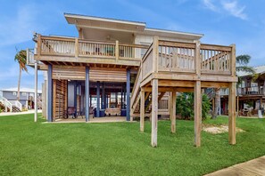 Property grounds - Serene sound-front home with a covered patio, dock, and swing bed (Dauphin Island)