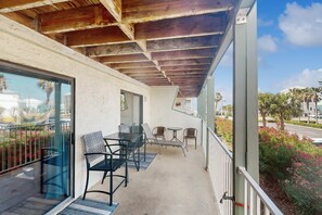 Terrace/patio - Tropically decorated condo in gulf-side complex w/shared pool, central AC, WiFi (Gulf Shores)
