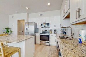 Fridge, microwave, oven, stovetop - Fantastic home on beach with pool, hot tub, free WiFi, elevator, & central AC (Gulf Shores)