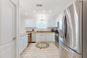 Fridge, microwave, oven, stovetop - Updated luxurious home w Gulf views, gas grill, WiFi, AC, W&D (Gulf Shores)