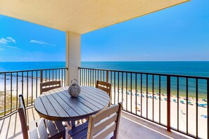 Outdoor dining - Beachfront condo with Gulf view, balcony, pools, hot tub & gym (Orange Beach)