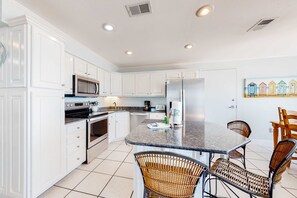 Fridge, microwave, oven, stovetop - Gulf-front home on the beach with 3-tier deck, Gulf views & pool access (Orange Beach)