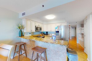 Fridge, microwave, oven, stovetop - Gulf-front condo with beach access, private balcony, hot tub, pools & BBQ (Orange Beach)