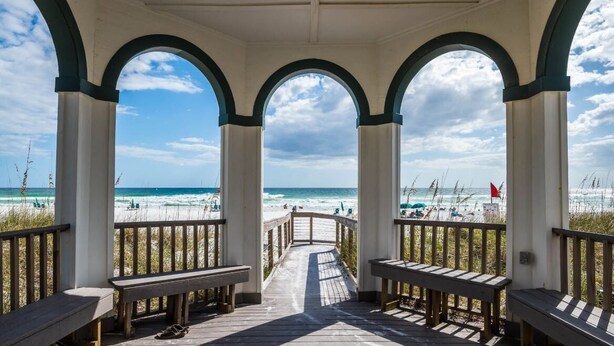 A covered wooden deck with benches overlooking a beach. - Azure! Sleeps 22 ! Golf Cart ! Beach Access ! Pool! (Destin)