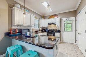 Fridge, microwave, oven, stovetop - Spacious condo with pool & screened porch (Orange Beach)