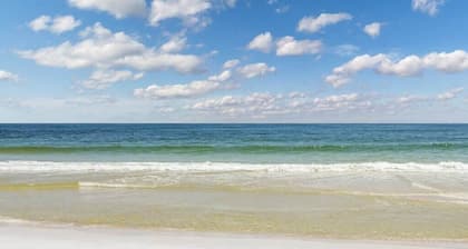 Gulf view condo w/ a full kitchen, private balcony, shared pools, & tennis court
