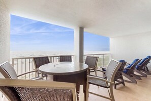 Outdoor dining - Gulf front escape w/ balcony, shared hot tub, pools, tennis, & beach access (Orange Beach)