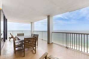 Outdoor dining - Gulf-front condo with balcony, hot tub & pools - snowbird-friendly (Orange Beach)