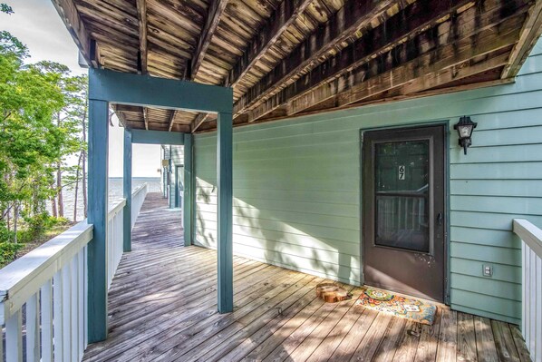 Terrace/patio - Updated condo on Wolf Bay with shared pool, tennis, and boat launch! (Orange Beach)
