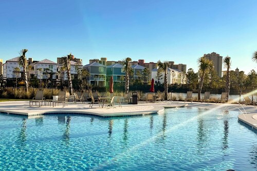 Modern beach house with porches, private washer and dryer- walk to the beach