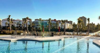 Modern beach house with porches, private washer and dryer- walk to the beach