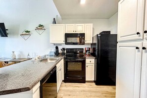 Fridge, microwave, oven, stovetop - Gorgeous & sun-kissed retreat with pool, gym, W/D, & incredible balcony views (Orange Beach)