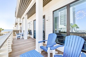 Outdoor dining - Spacious beachside community home with ocean view, private pool, & fireplace (Orange Beach)