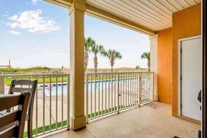 Terrace/patio - Ground-floor condo with beachfront access, pool, patio, & 2 full kitchens (Dauphin Island)