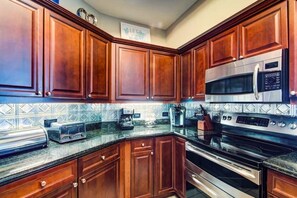 Fridge, microwave, oven, stovetop - Gorgeous beachfront condo, shared pool and beach access (Gulf Shores)