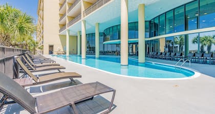 Sunlit beach condo with pool, hot tub, & amazing view - steps to the sand
