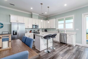 Fridge, microwave, oven, stovetop - Idyllic, dog-friendly Bay Front Island home with pool, Gulf view & large decks (Dauphin Island)