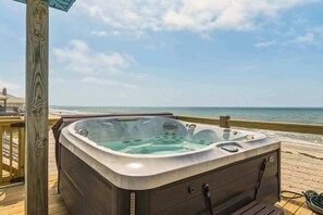 A hot tub on a wooden deck with a view of the ocean. - Coastal Gem on the Sand With Large Deck, Ocean Views & Private Pool & Hot Tub (Dauphin Island)