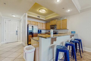 Fridge, microwave, oven, stovetop - Lovely Gulf front condo w/shared sauna, hot tub, indoor pool, & stunning views (Dauphin Island)