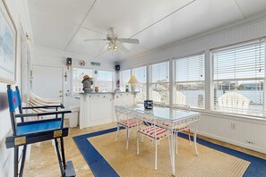 Dining - Bayfront home with private dock, deck & sleeper porch - dog-friendly (Dauphin Island)