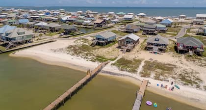 Welcoming home with WiFi, gulf views & spacious deck - steps to the beach