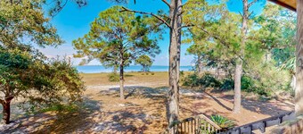Bayfront home with Gulf views & deck with private swim spa - dog-friendly