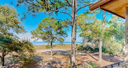 Bayfront home with Gulf views & deck with private swim spa - dog-friendly