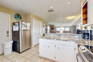 Fridge, microwave, oven, stovetop - Family-friendly, beachfront getaway with a stainless kitchen & shared pool (Dauphin Island)