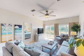 TV, offices - Dog-friendly condo w/ views of the bayou, shared pool - close to the bayou (Dauphin Island)