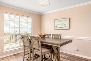 Dining - Newly remodeled bay view home with high-speed WiFi, central AC, and gas grill (Dauphin Island)