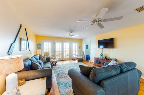 Dog-friendly, water view beach house with a full kitchen, furnished deck, private