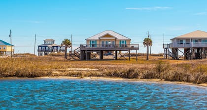 Dog-friendly, water view beach house with a full kitchen, furnished deck, private
