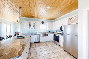 Fridge, microwave, oven, stovetop - Charming bay-front home with WiFi, spacious wraparound porch, private deck (Dauphin Island)