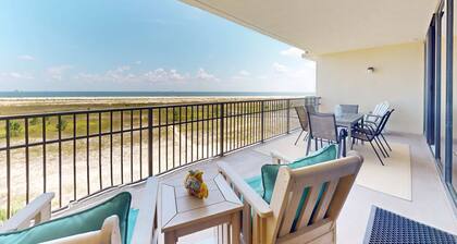 Beachfront condo with pool, private balcony, and laundry