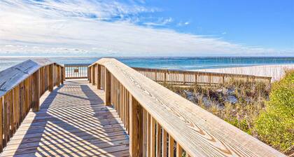 Coastal condo with water views, shared pool, and tennis court