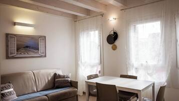 Appartement Confort, climatisation | Coin séjour