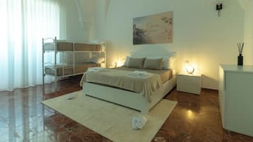 Deluxe Suite, Courtyard View | Premium bedding, iron/ironing board, free WiFi