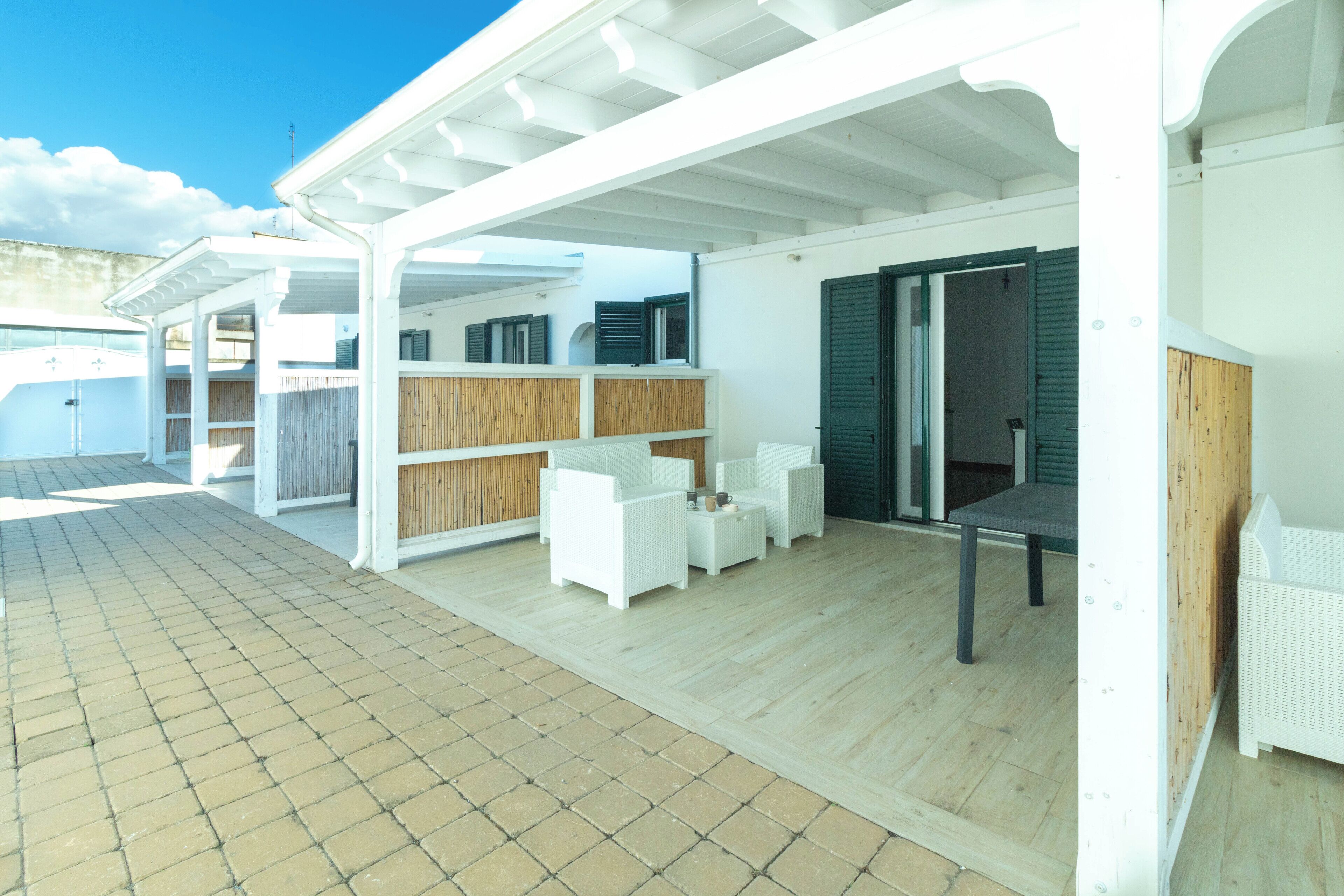 Casa Confort, vista al patio | Terraza o patio