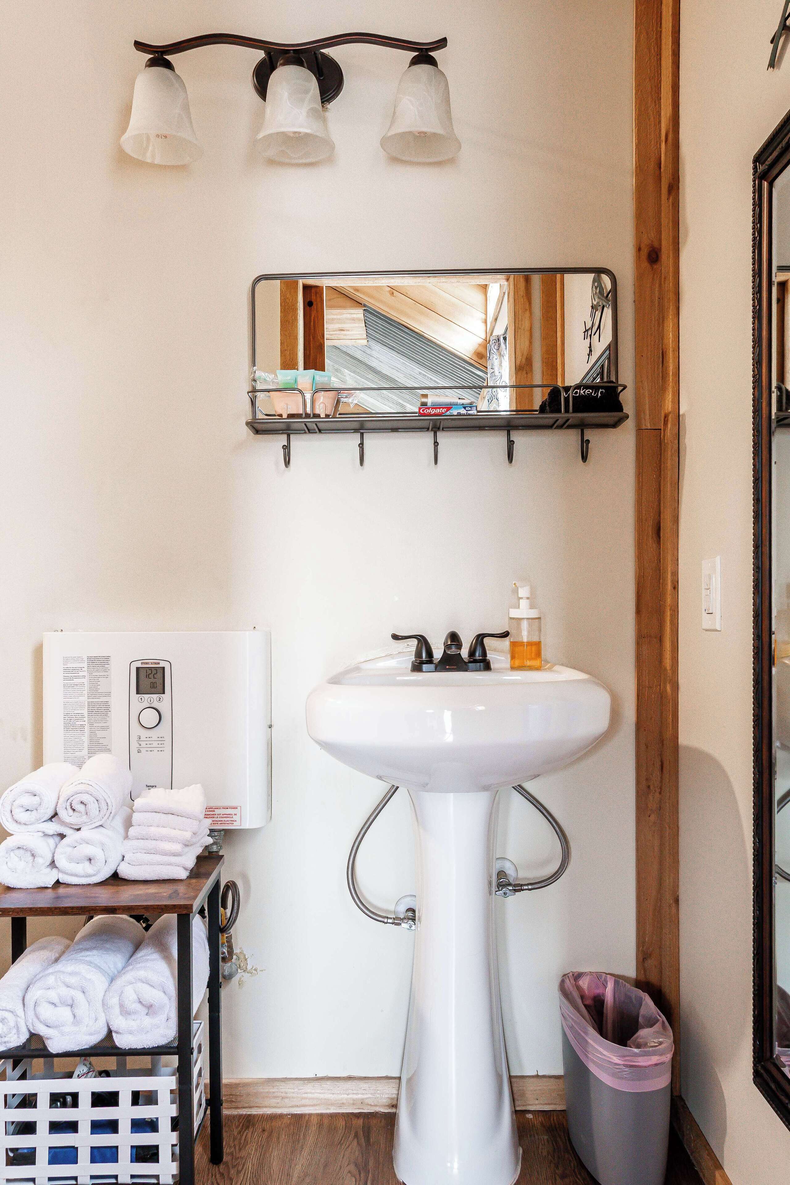 Shower, hair dryer, towels, shampoo