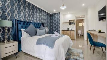 Quarto casal luxo, vista para o jardim