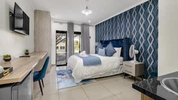 Quarto casal luxo, vista para o jardim