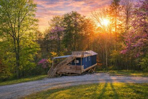 Exterior - Blue Bird Tiny House Shipping Container: Hot Tub + Rooftop Deck in Hocking Hills (Logan)